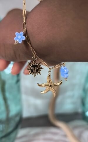 bracelet charms details zoom fleurs bleues, soleil etoile de mer – rose carmel