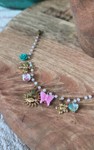 Bracelet doré avec charms - Féminin et solaire