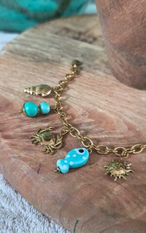 Bracelet doré avec charms - Féminin et solaire